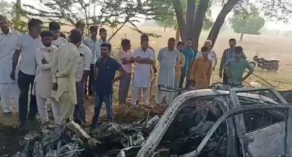 Car driver burnt alive by bus collision