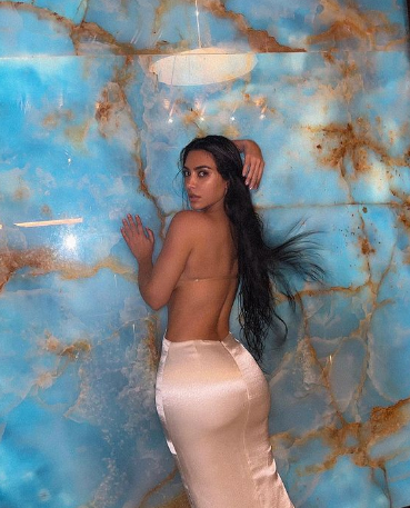 Kim Kardashian shares Photos In Backless Off Shoulder Gown