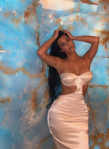 Kim Kardashian shares Photos In Backless Off Shoulder Gown