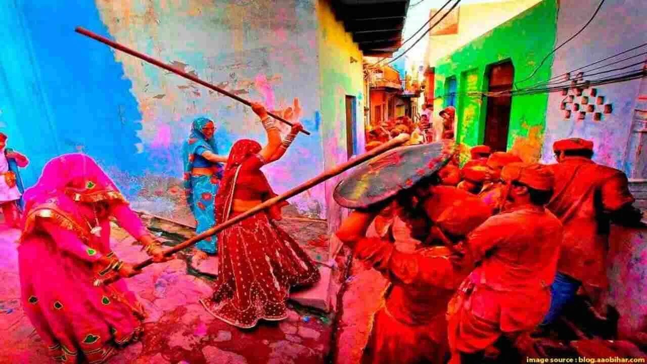 Holi 2024: इन जगहों पर मनाई जाती है लट्ठमार होली, जानें कैसे शुरू हुई यह परंपरा