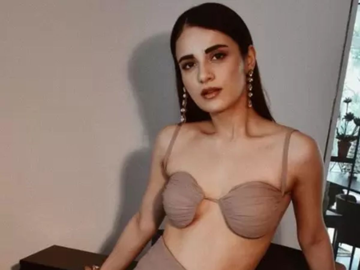 Radhika Madan looks classy and sleazy in a nudetone bustier - Photo Gallery