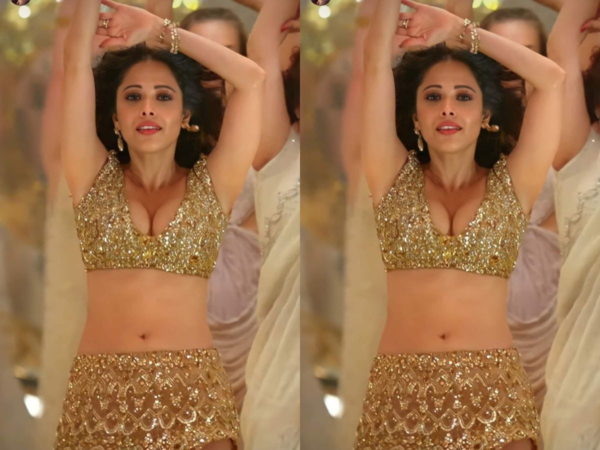 The thigh high slit of the golden lehenga added spice - Photo Gallery