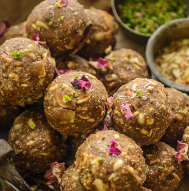 Eating Gond Laddu - Photo Gallery