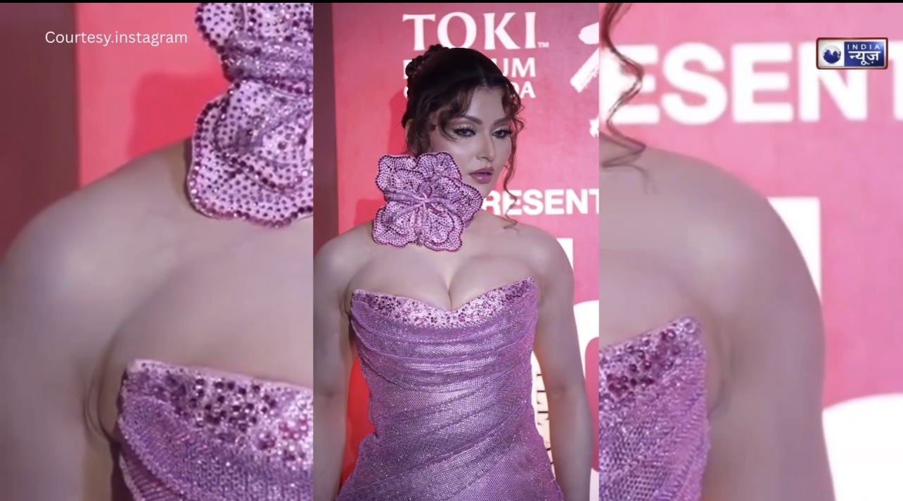 Urvashi Rautela Looks Stiff! एक्ट्रेस की ड्रेस में लगे बड़े फूल ने बनाया उनका ‘वन-वे’ लुक, देखें वीडियो!