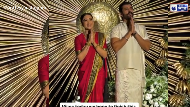 “देसी गर्ल” बनीं Rashmika Mandana: रिसेप्शन में लाल साड़ी और गजरे का जादू, Vijay के ‘रॉयल लुक’ ने जीता दिल!