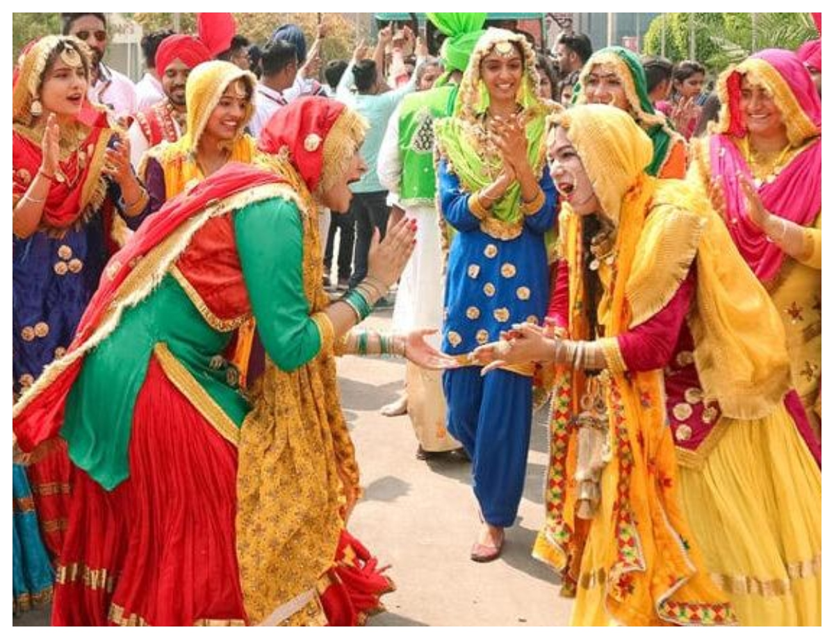 Bhangra is not just limited to men. - Photo Gallery